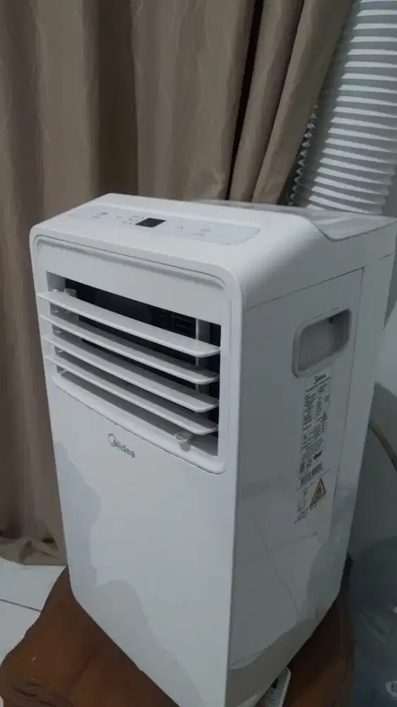 Ac midea portable 1/5 pk (setengah pk)