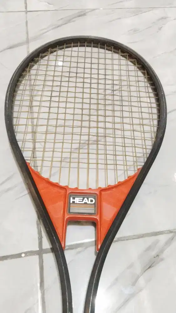 Raket tenis head