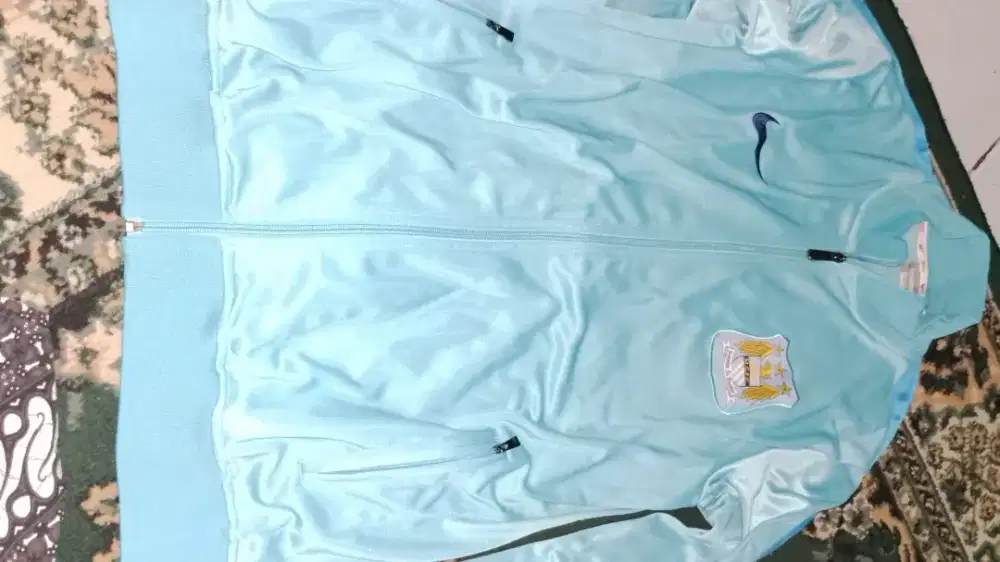 Jaket manchester city ori