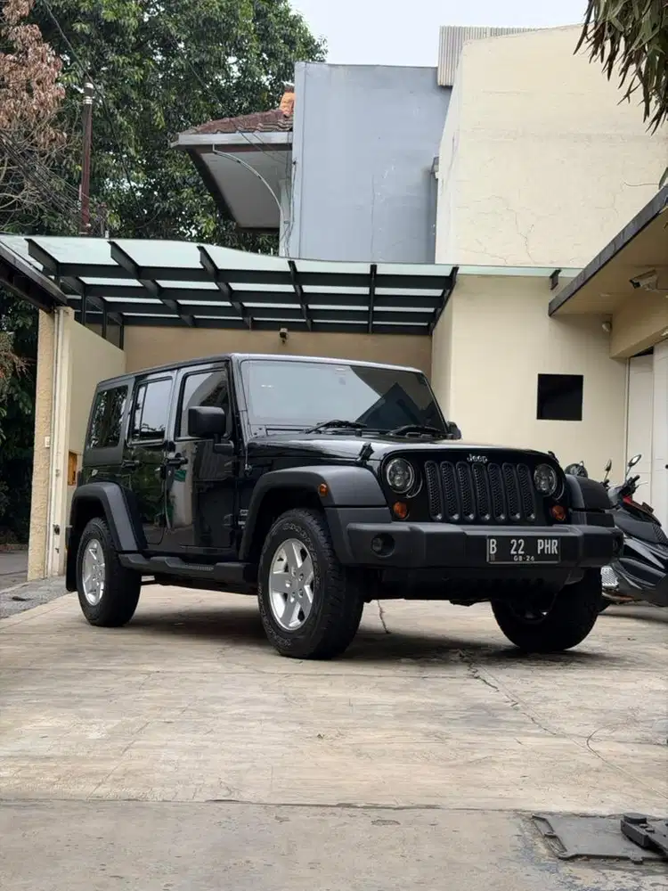 Jeep wrangler jk sport 2011 hitam km 38rb