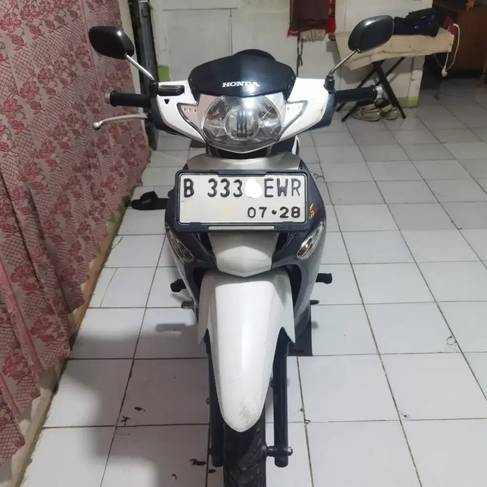Supra x 125 pgm fi 2006 putih abu abu