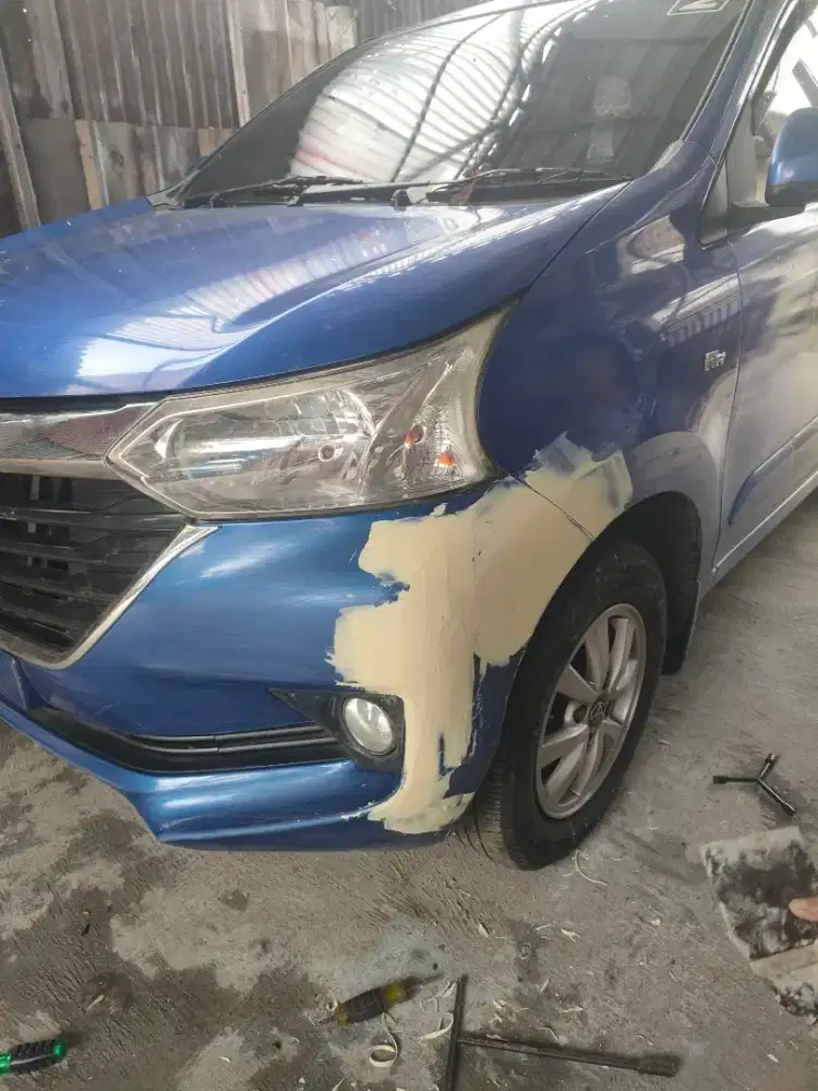 Body repair mobil dan motor