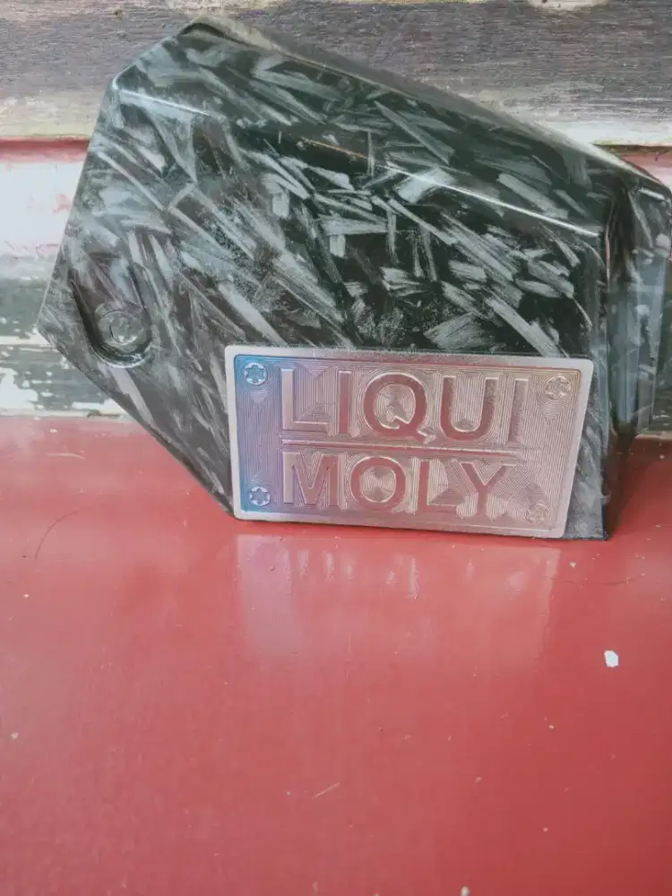 *COVER RESERVOIR HUGGER CARBON FORGED + EMBLEM TITANIUM 

COVER FILTER