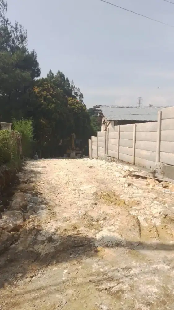 Turap beton land clearing bongkar bangunan ruko