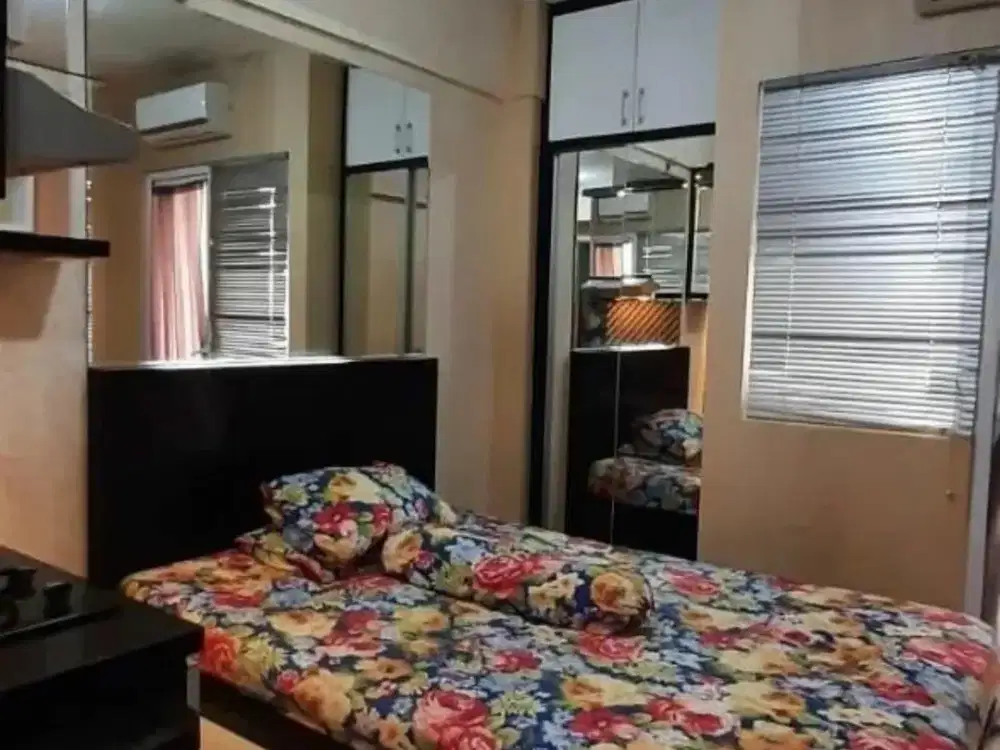 The green apartment pramuka city studio mall