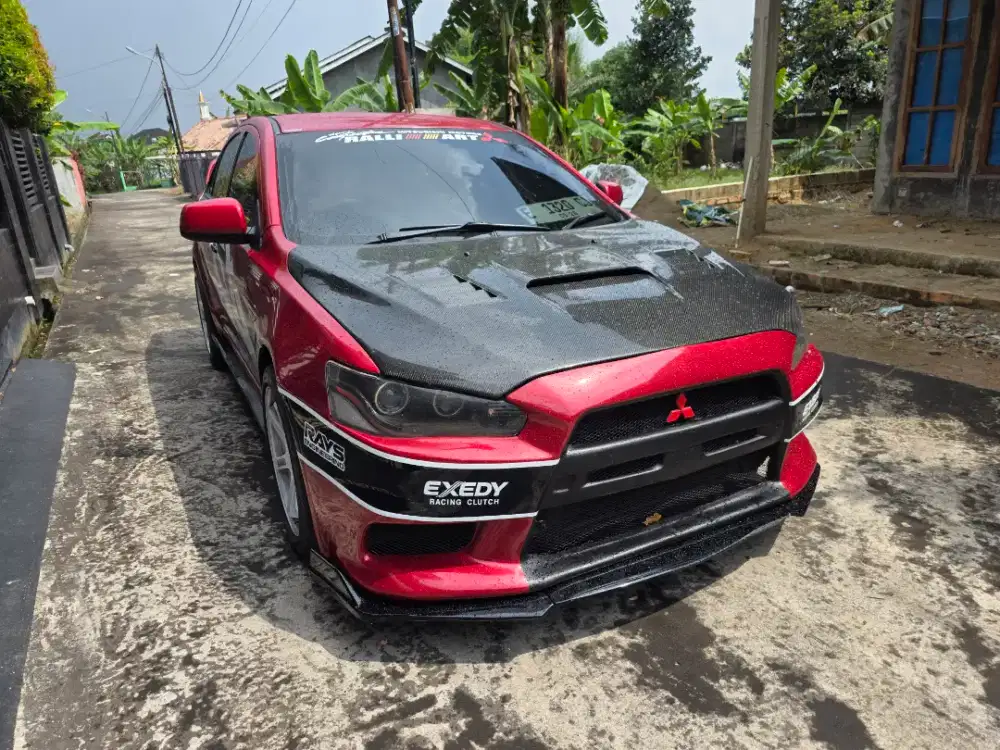 Lancer ex 2010 warna merah