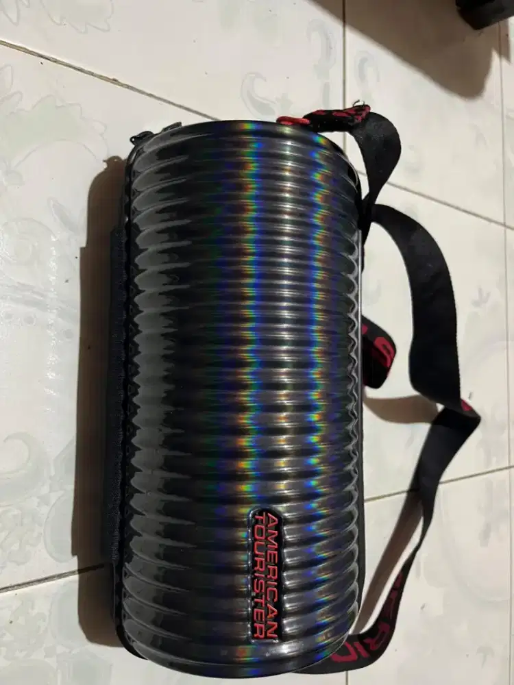 Tas selempang american tourister