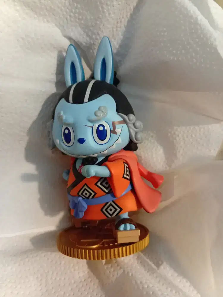 Pop mart and miniso action figure