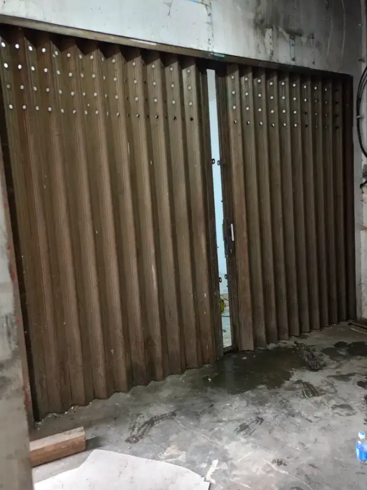 Ahli servis rolling door murah kota Depok