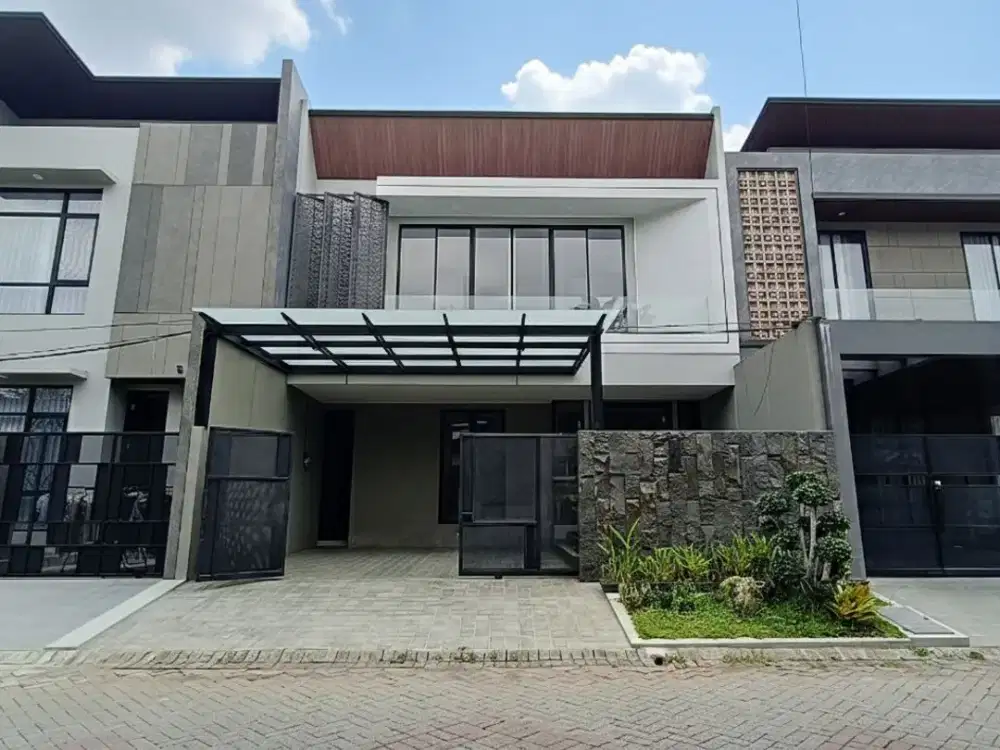JUAL RUMAH BARU MODERN TROPICAL  MINIMALIS ARAYA SURABAYA