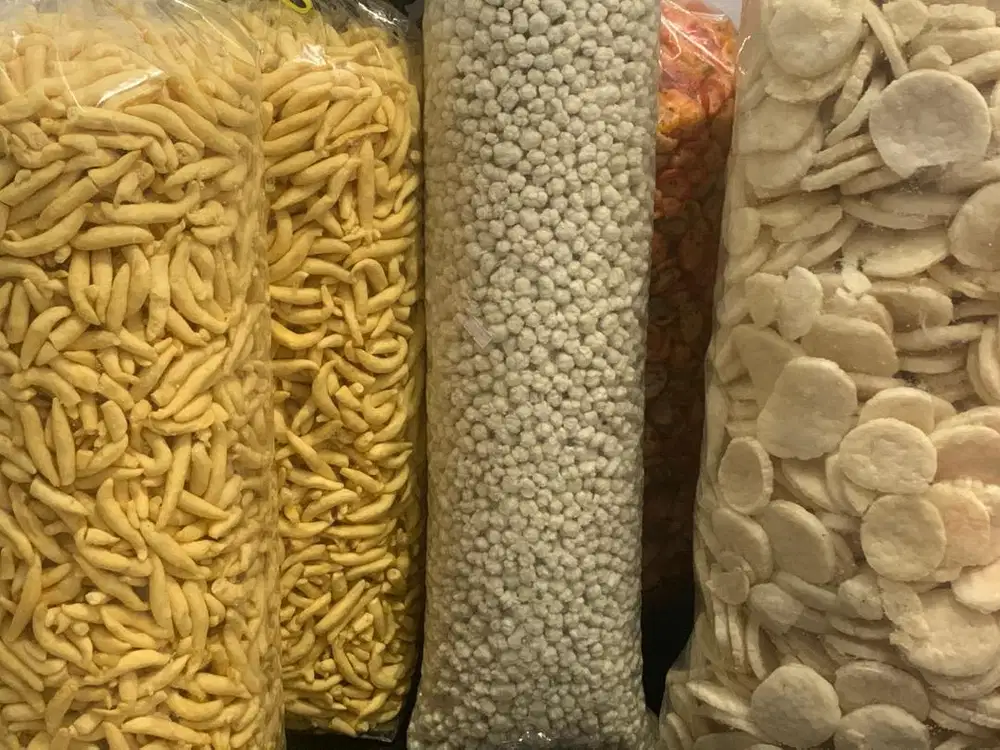 Cati tukang bungkus snack