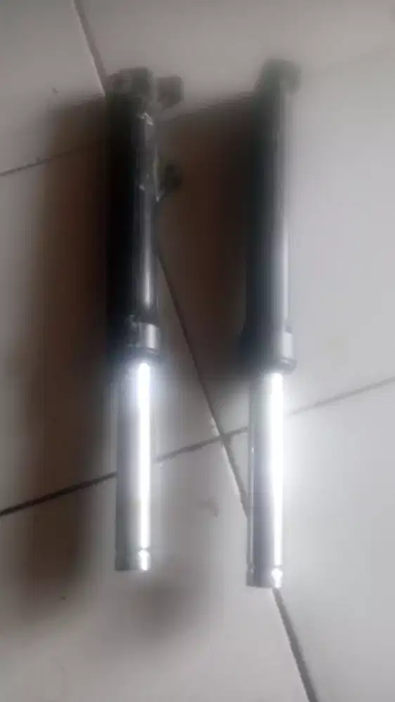 Sok depan mio smile dan sporty