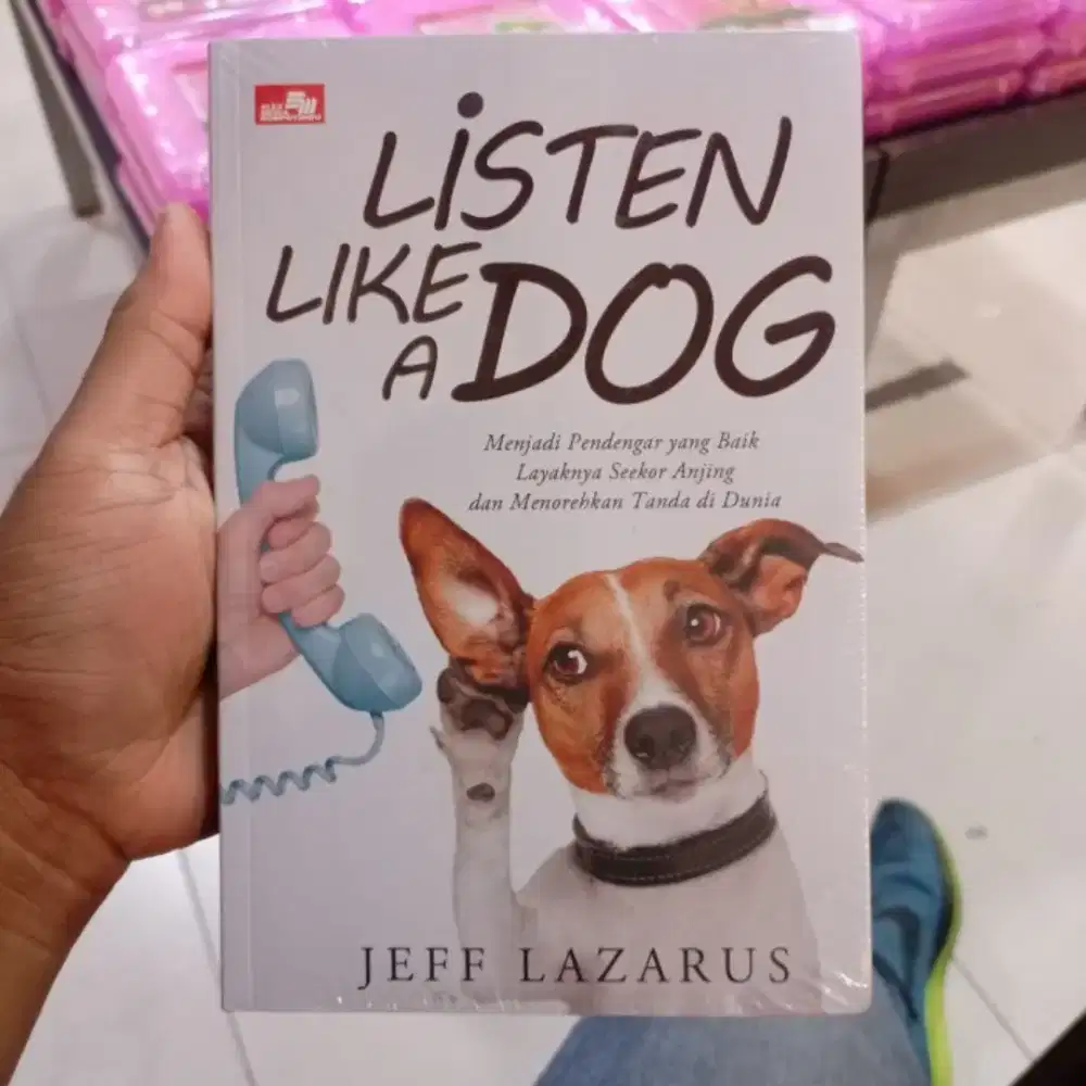 Buku cara memelihara dan memahami bahasa anjing