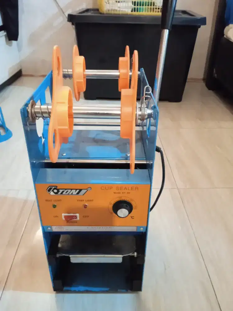 Mesin press minuman cup