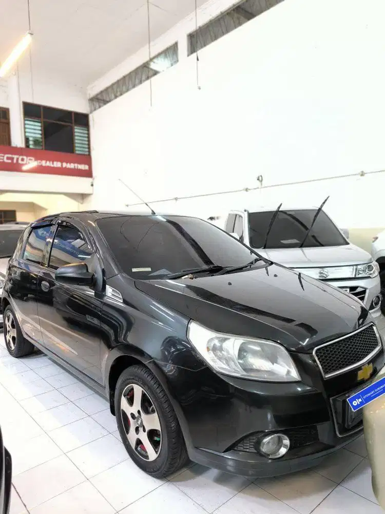 CHEVROLET 2008 AVEO 1.5 M/T HITAM MURAH OTOMART 286 KENJERAN