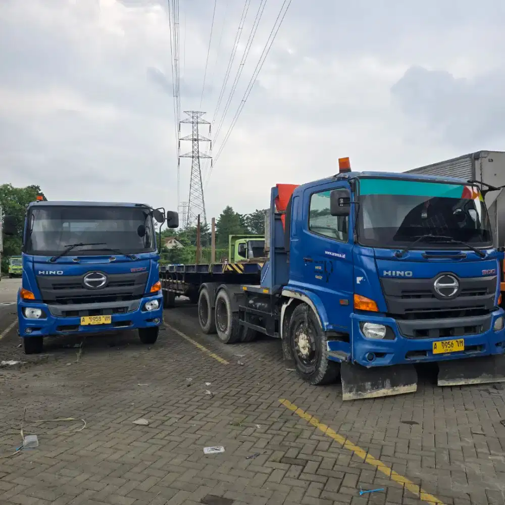 Sewa truk trailer 12 meter flat bed