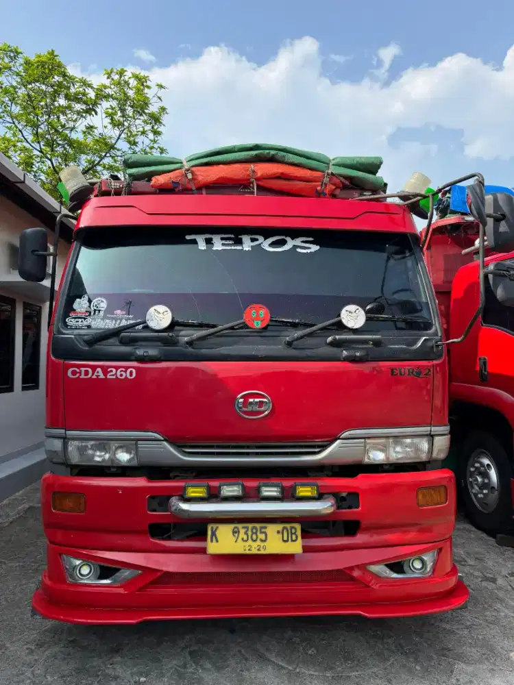 Truk Nissan Euro Tronton CDA260M 6x2 Th'13 Bak Dropside Long Sgt Istw