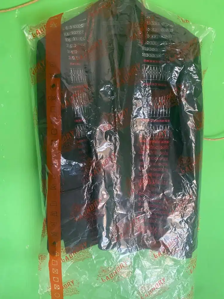 Dijual jas satu stelll ada motip gorga