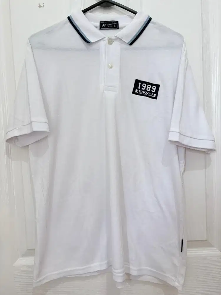 Kaos berkerah polo arizona zeans putih ukuran L dan M