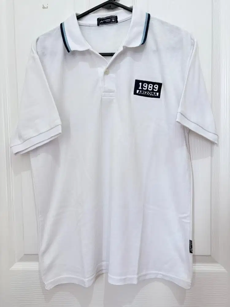 Kaos berkerah polo arizona zeans putih ukuran L dan M