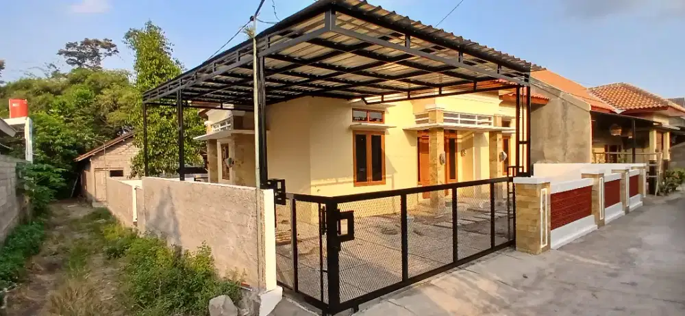 Gerbang pagar pintulipat besi