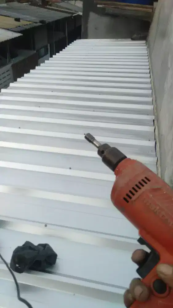 Tukang bangunan siapa untuk anda