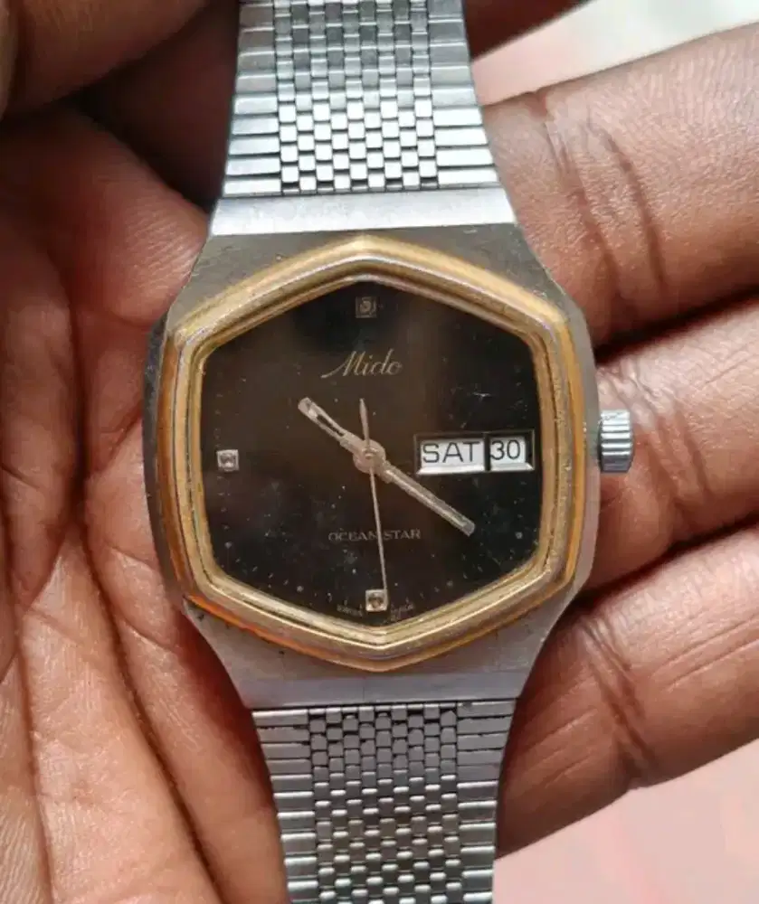 Jam tangan mido tua