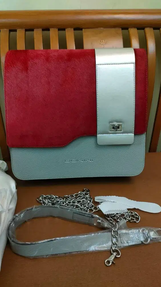 Donini tas warna abu merah