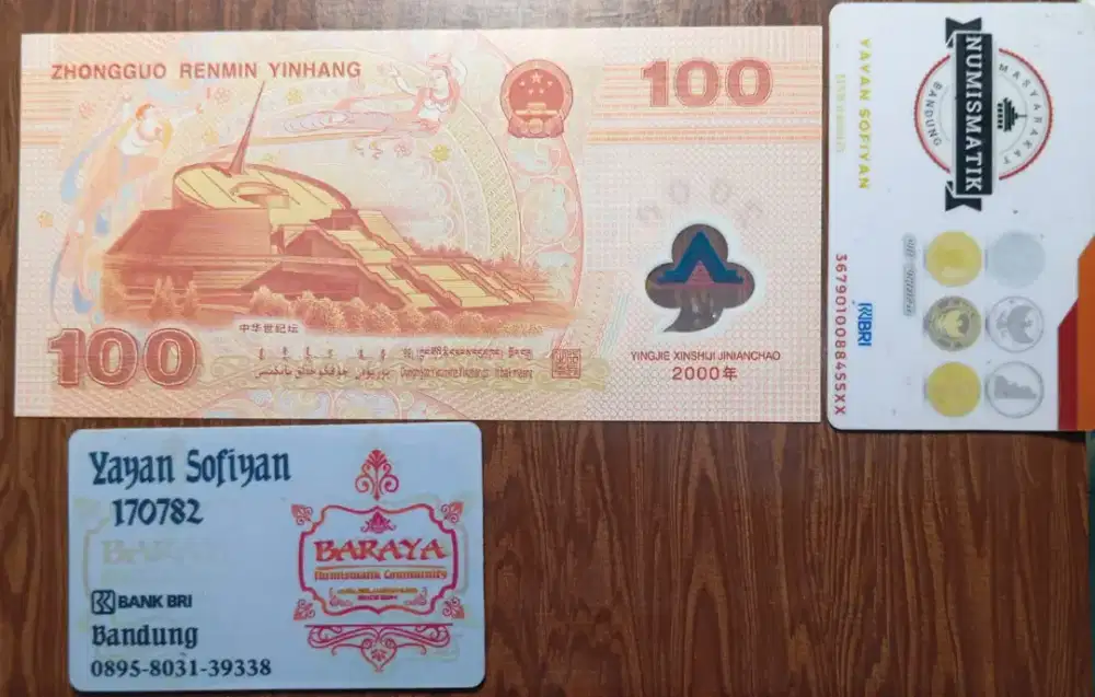 Uang peringatan polimer 100 Yuan China