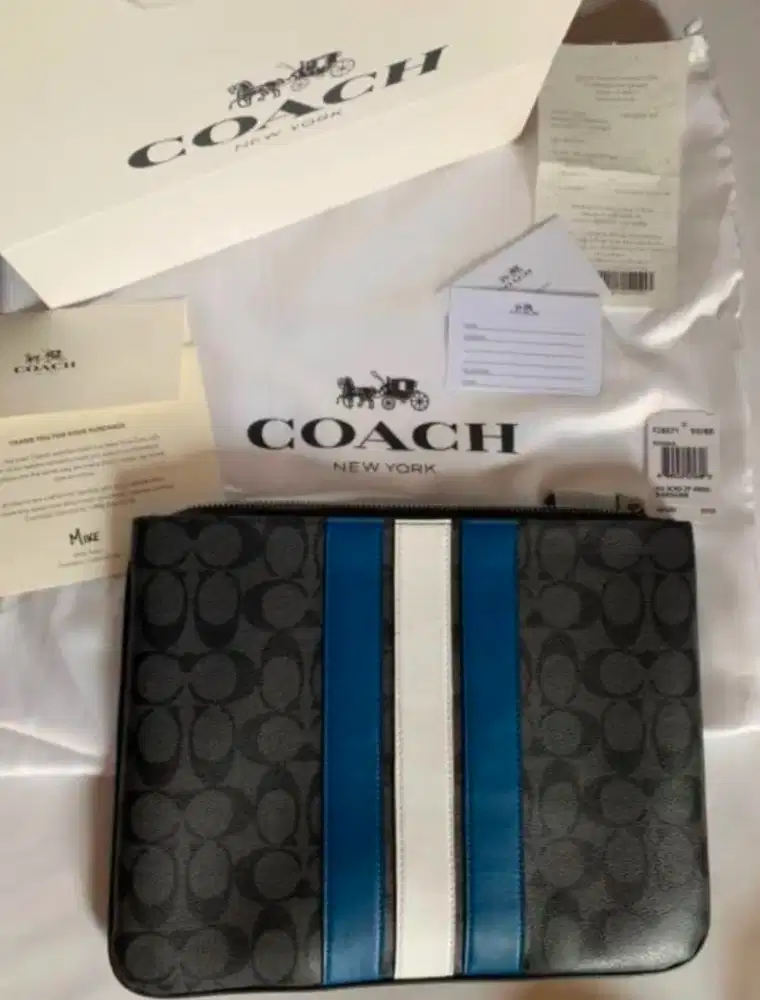 tas pouch pria coach

Garis Biru