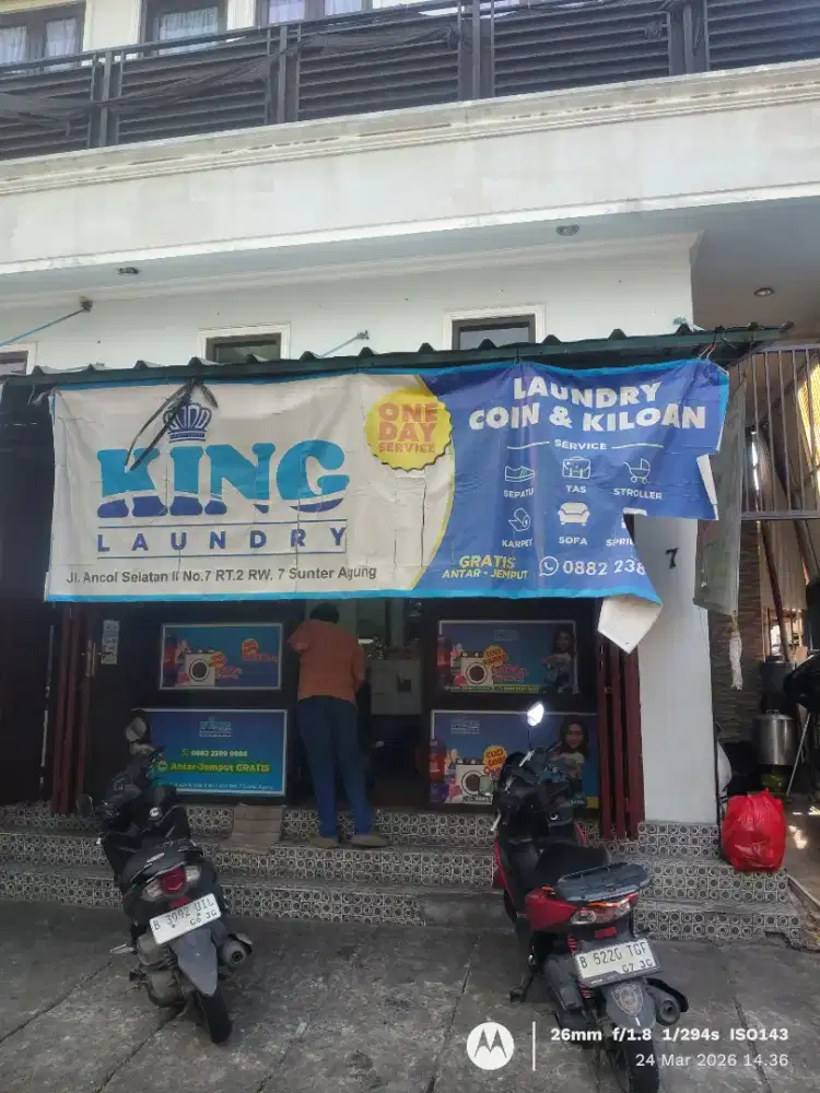 Tukang setrika laundry