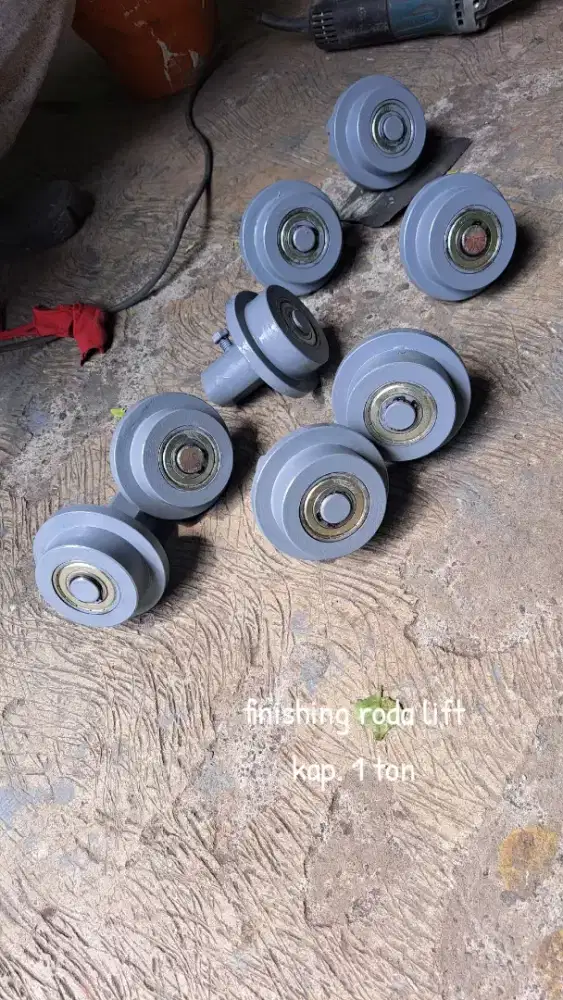 Roda Lift (lift barang)