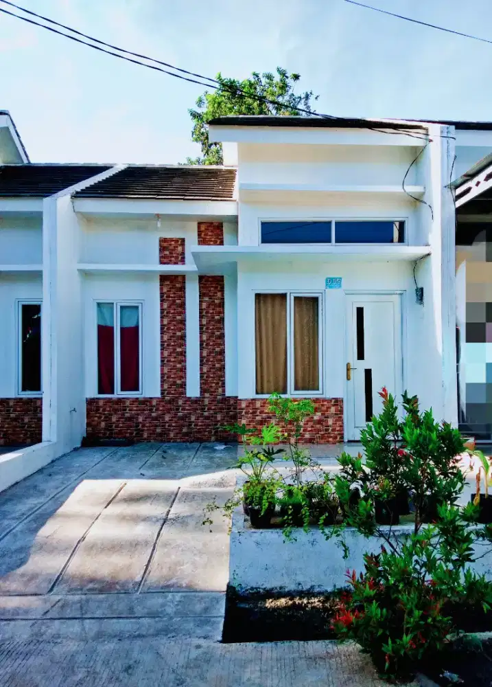 Over kredit rumah cluster