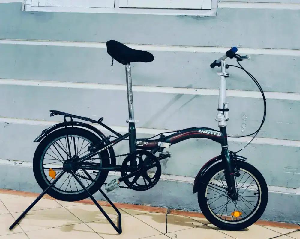 Sepeda lipat merek united uk'16 hrg 550rb net