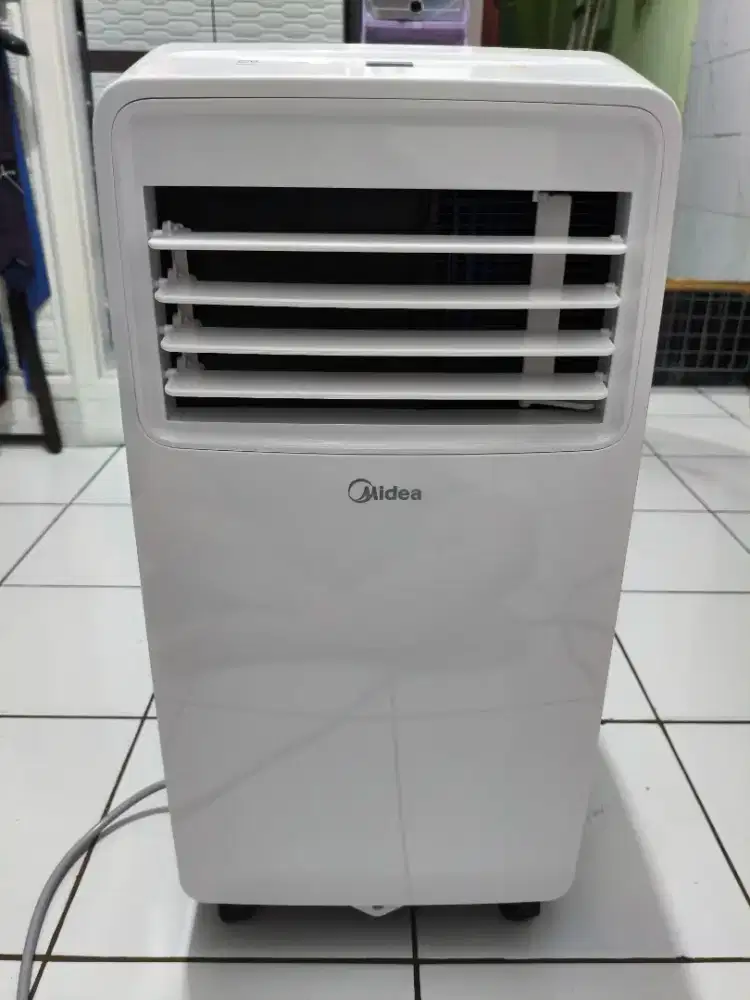 AC Portable Midea 1/2 PK