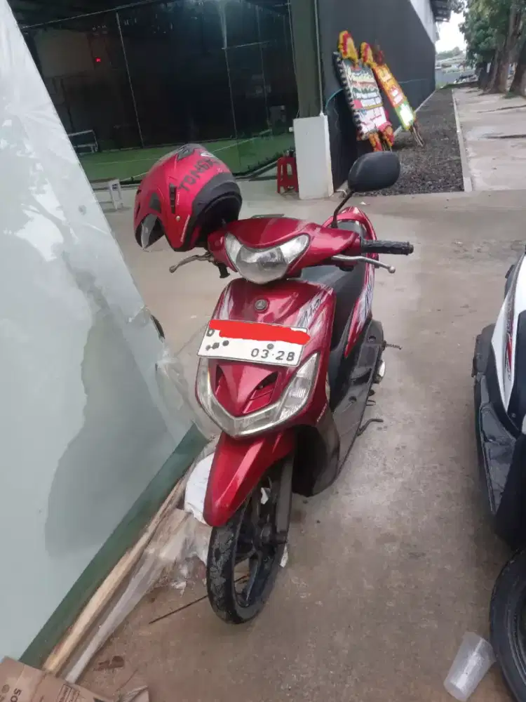 Mio tahun 2010 Merah