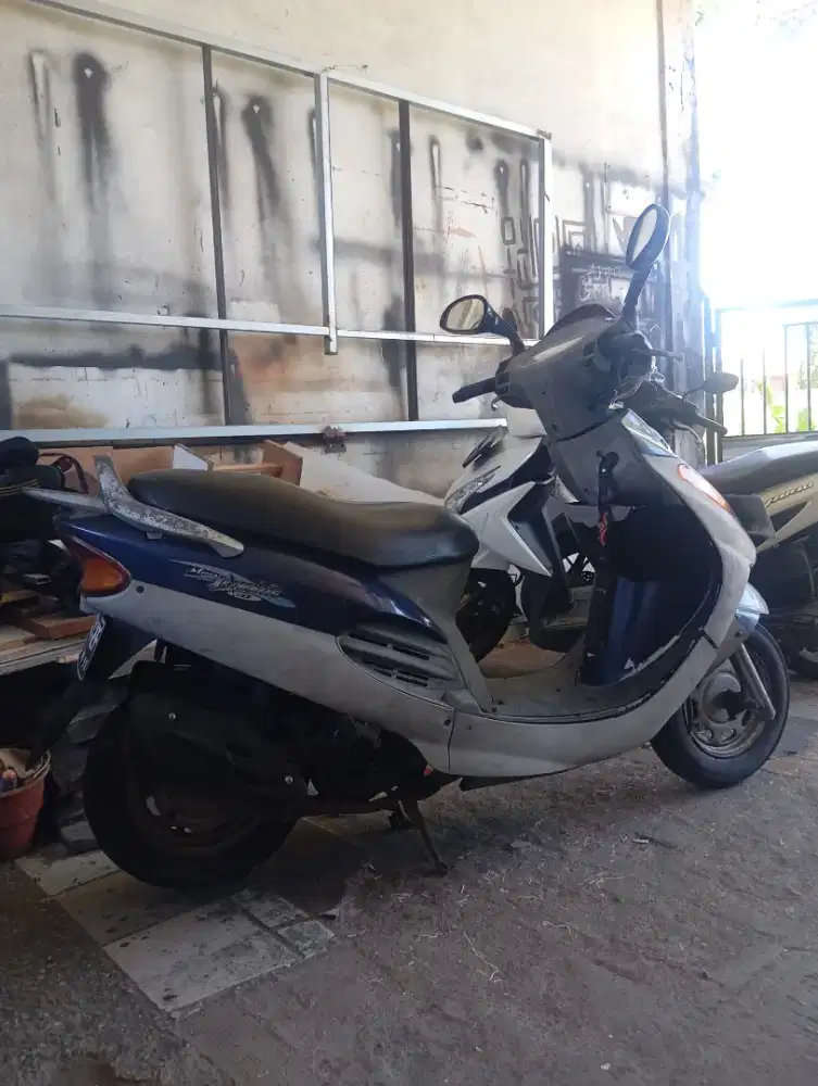 Kymco metica tangki belakang