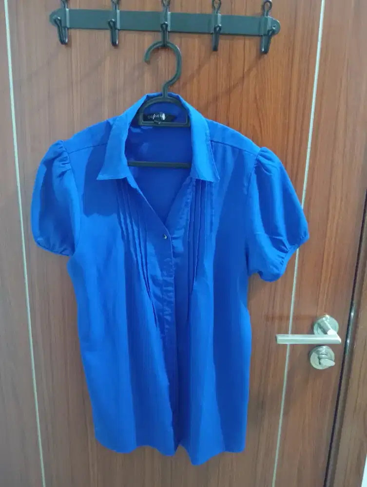 Kemeja biru merk conexion