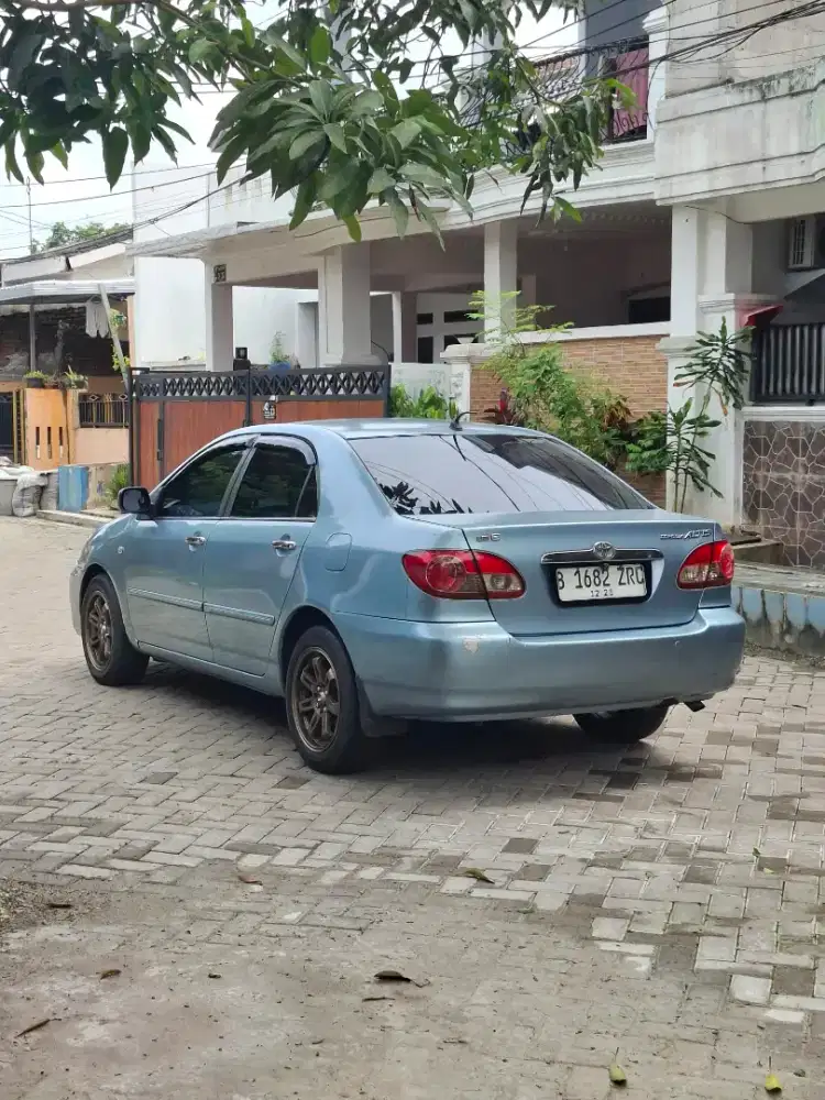 Jual Corolla Atis Manual 2003 pakaian pribadi