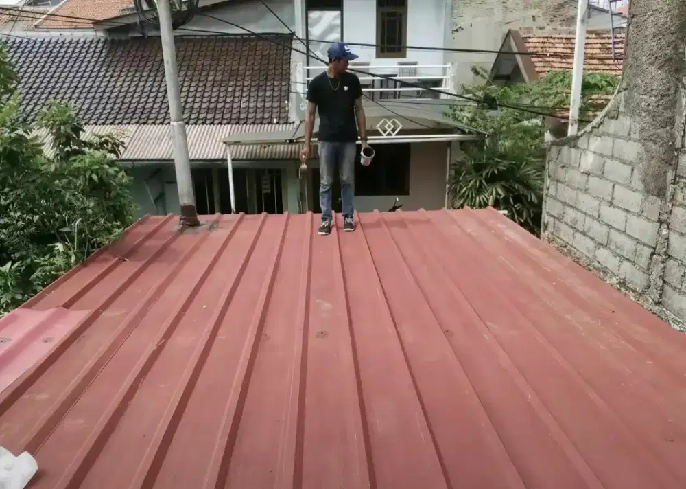 Pasang baja ringan atap spandek pasir