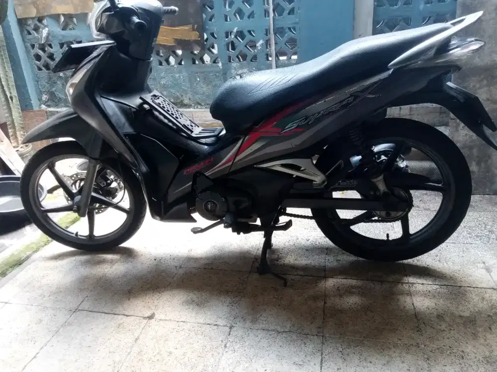 jual supra x 125 helm in pgm fi 2013