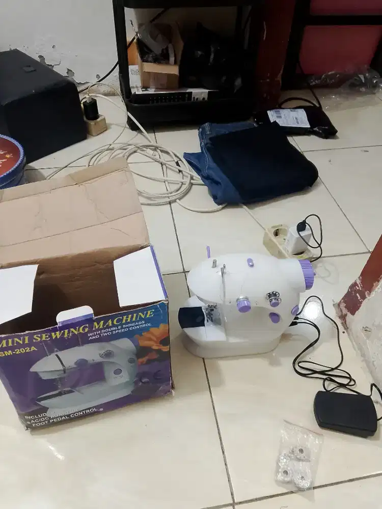 Mesin jahit mini porable