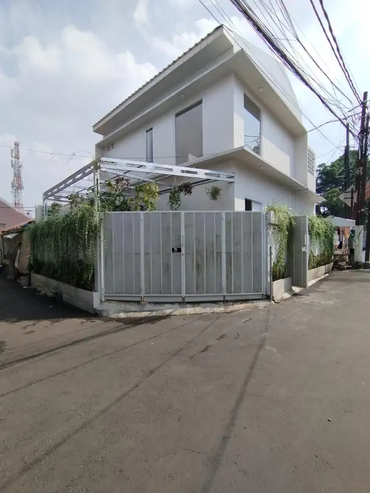 Rumah pinggir jalan