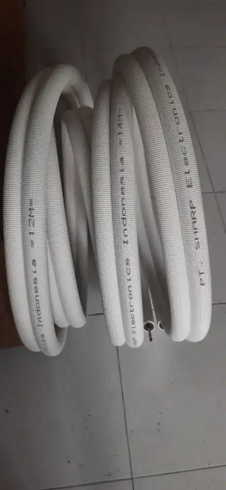 Selang ac merk sharp