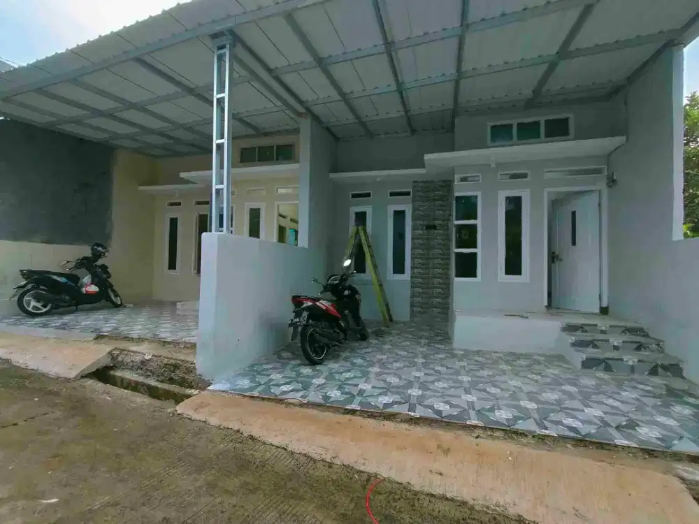 Rumah ready siap huni sudah free canopi dan keramik carport..