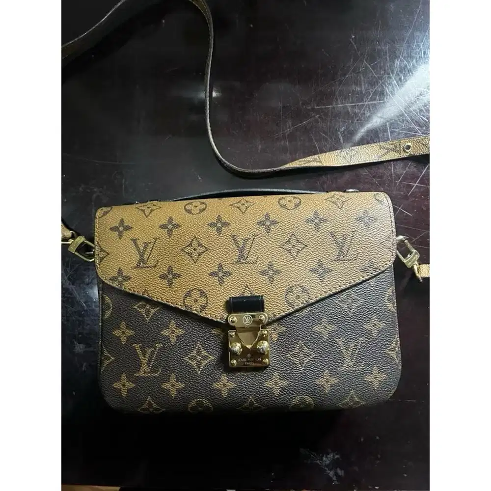PRELOVED: Premium L Pochette Métis Monogram