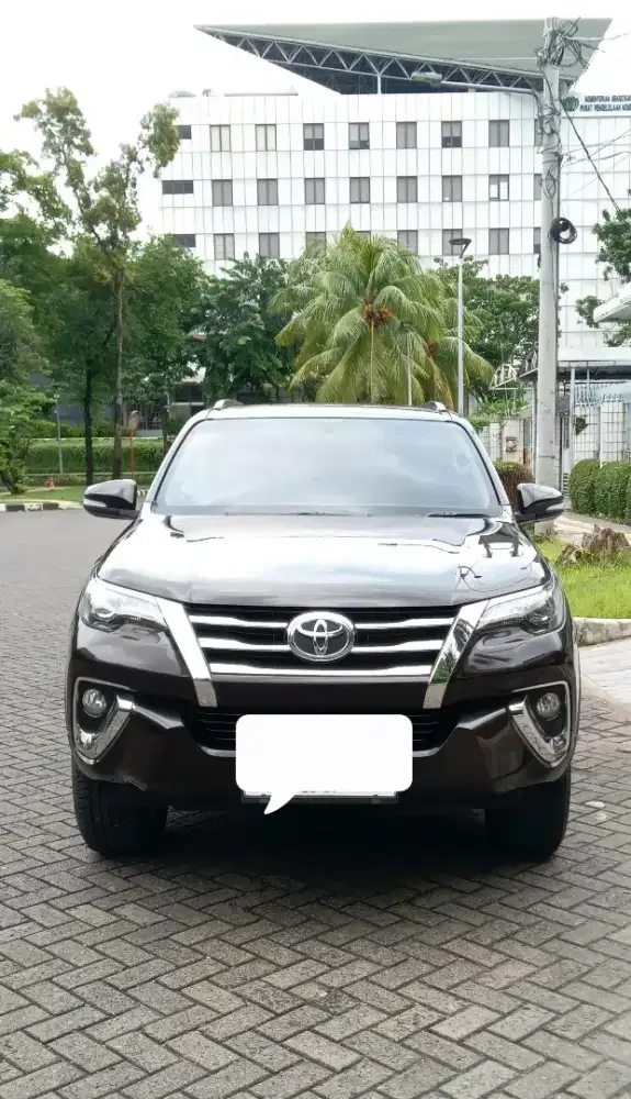 Fortuner SRZ 4×2 2.7 AT Bensin Coklat tua met 2016