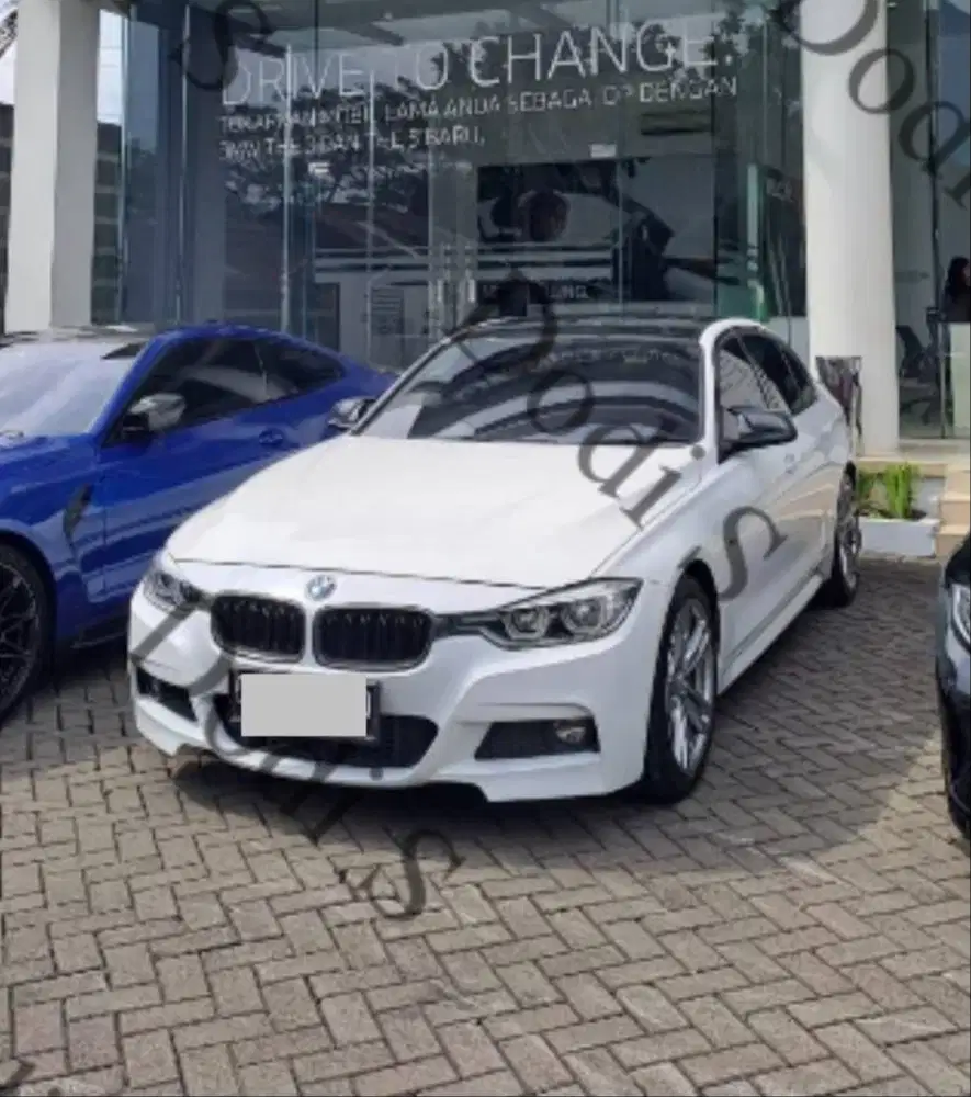BMW 330i A/T tahun 2016 (NIK 2017)