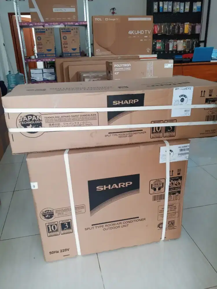 SHARP 1/2 PK Garansi Resmi segel