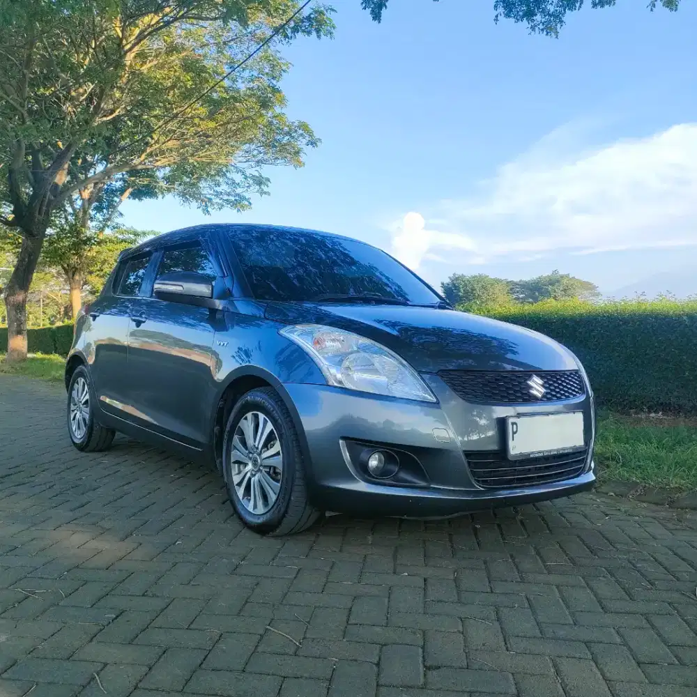 Suzuki Swift GX Km Low 2013
